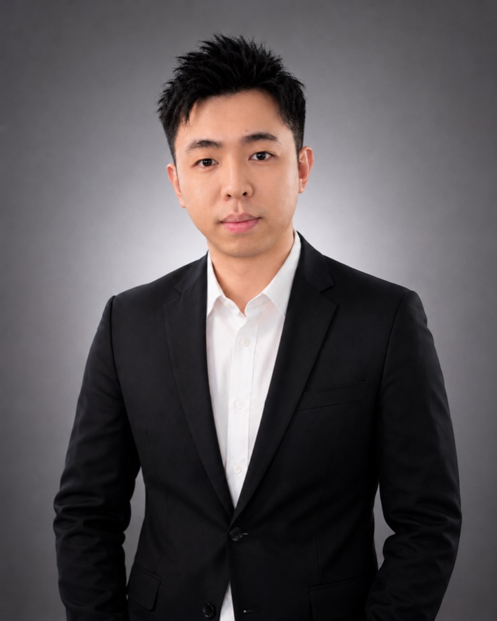 Portrait of Tze Ming Luk, Founder & Director of ATOM X